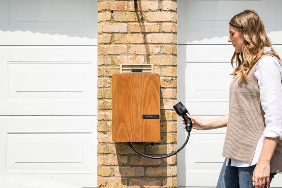 EV home charger mounted on a garage wall