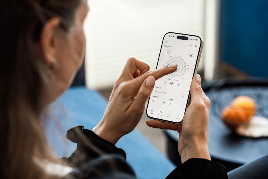 A person setting up a smart home automation on their phone