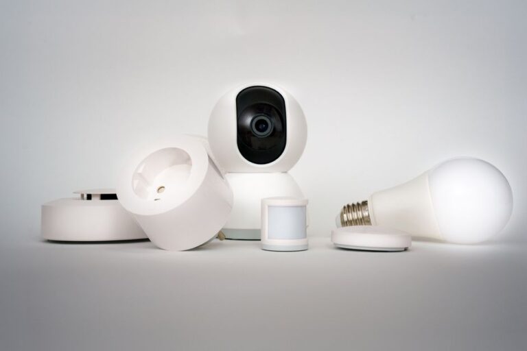 An assortment of smart home starter devices - camera, plug, sensor, bulb