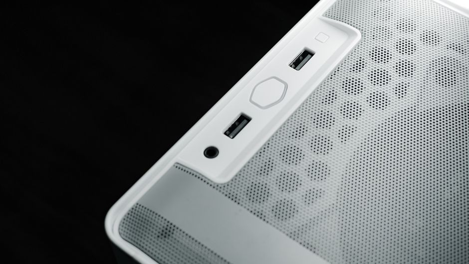 A collection of smart home hub devices on a shelf